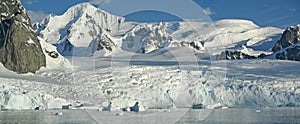 Glaciated mountains and icefall photo