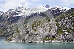 Glacier Bay National Park Rocky Shore And Snowy Mountains