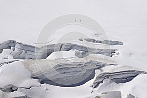 Glacier crevasses and seracs in a snow field in the Mont Blanc a