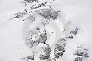 Glacier crevasses and seracs in a snow field in the Mont Blanc a