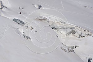 Glacier crevasses and seracs in a snow field in the Mont Blanc a