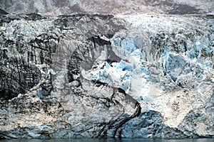 Dramatic ice details on a glacier wall. photo