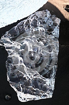 Glacier ice chunks on the black beach at Jokulsarlon, Iceland