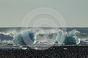 Glacier ice chunks on the black beach at Jokulsarlon, Iceland