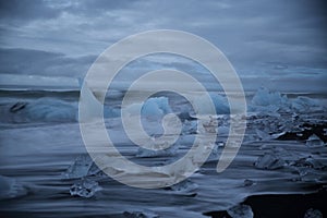 Glacier ice chunks on the black beach at Jokulsarlon, Iceland