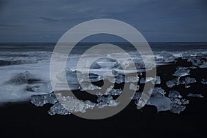 Glacier ice chunks on the black beach at Jokulsarlon, Iceland