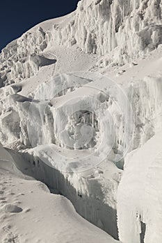 Glacier ice walls, volcano Cotopaxi photo