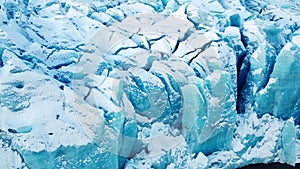 Glacier in Iceland beautiful Ice from pure blue water close up aerial top view winter landscape in 4k