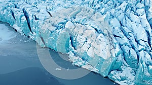 Glacier in Iceland beautiful Ice from pure blue water close up aerial top view winter landscape in 4k