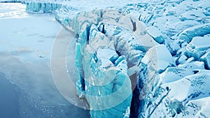 Glacier in Iceland beautiful Ice from pure blue water close up aerial top view winter landscape in 4k