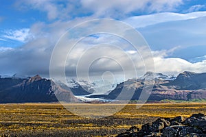 glacier in Iceland with lava road