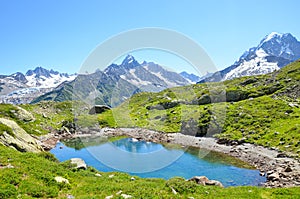 Glacier Lac de Cheserys, Lake Cheserys near Chamonix-Mont-Blanc in French Alps. Alpine lake with snow-capped mountains in the