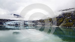 Glacier and mountain with clouds panorama, Alaska.