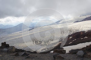 Glacier in the mountains of the Caucasus in summer