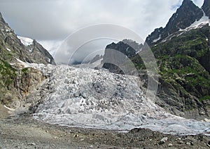 Glacier rocky peaks with snow in Svanetia Caucasian mountains in Georgia