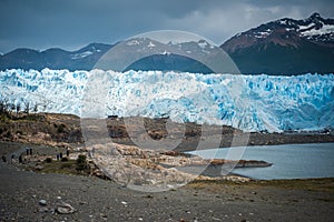 Glacier on the shore of the bay. Shevelev.