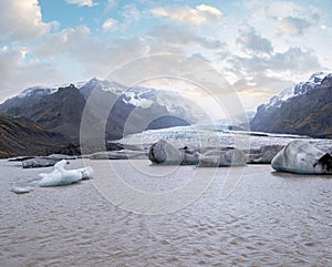 Glacier tongue slides from near subglacial Ã–rÃ¦fajÃ¶kull volcano, Iceland. Glacial lagoon