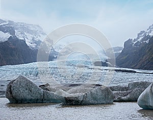 Glacier tongue slides from VatnajÃ¶kull icecap or Vatna Glacier near subglacial Ã–rÃ¦fajÃ¶kull volcano, Iceland