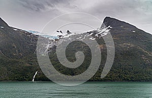 Glacier and waterfalls on west side Beagle Channel, Tierra del Fuego, Argentina