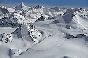 Glaciers and mountains in the Alps in winter photo