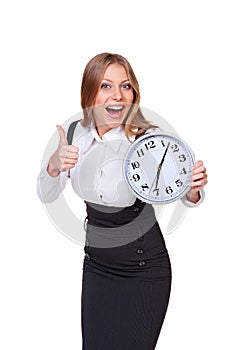 Glad businesswoman holding the clock