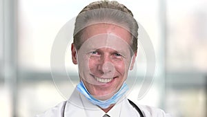 Glad happy mature man doctor face.