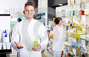 Glad man druggist in white coat