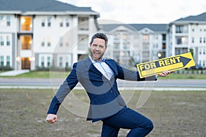 glad renter adviser man hold board for rent sign. rent house with renter adviser man