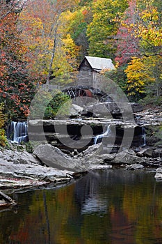 Glade Creek Grist Mill in Babcock State Park in Autumn with reflection