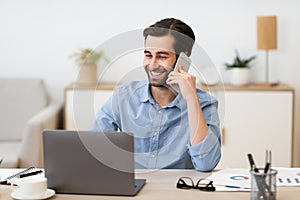 Gladful Man Talking On Phone Working Sitting In Office