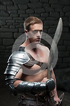 Gladiator with shield and sword