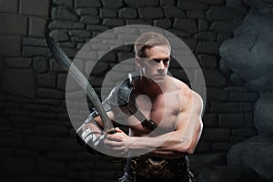 Gladiator with sword posing