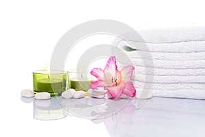 Gladiola, Candles, Towel and White Stones