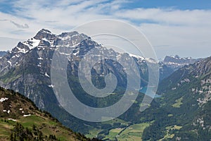 Glaernisch mountain, kloentalersee, cloudy blue sky photo