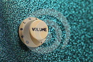 Glam rock guitar volume control close up