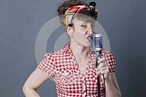 Glamor female rocker and vocal artist with retro style singing