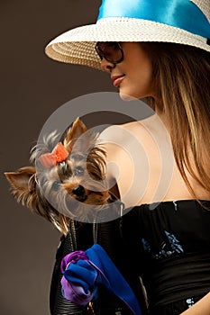 Glamor woman with Yorkshire Terrier