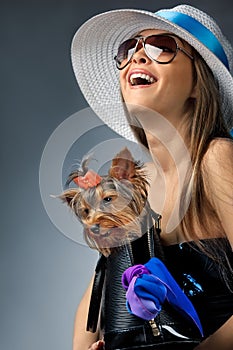 Glamor woman with Yorkshire Terrier