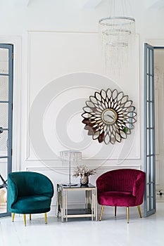 Glamorous, chic interior with coffee table and two chairs
