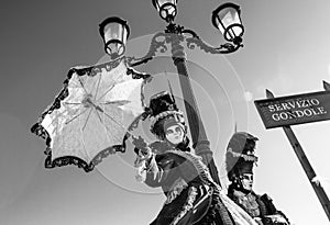 Glamorous, elegant and stylish performers during venice carnival