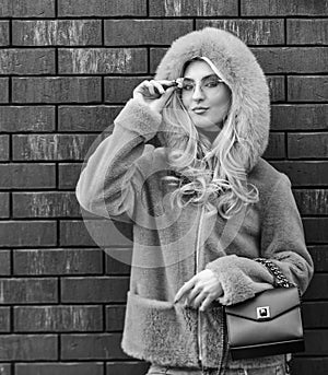 Glamorous lady. Fashion as unique as you are. Pink sheepskin coat. Fancy chic coat. Natural wool sheepskin coat. Fur on