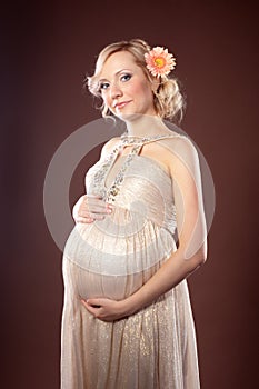 Glamorous portrait of a pregnant blonde