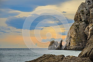 Glamorous sunset on the rocky shore of the Black sea, Crimea, Novy Svet.