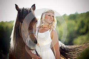 Glamorous woman with horse