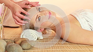 Glamorous Woman Receiving Fingertip Head Massage