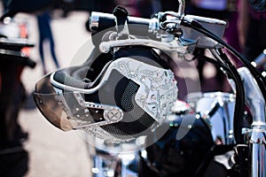 Glamorous women`s helmet weighs on a motorcycle