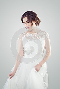 Glamorous young woman in bridal wedding dress, portrait