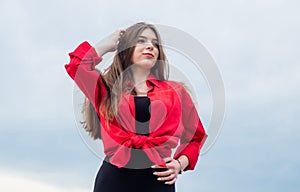 Glamour fashion model. happy childhood. pretty child on sky background. beauty and fashion.