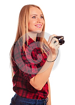 Glamour female photographer holding a compact camera - isolated