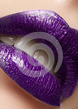 Glamour plum Gloss Lip Make-up. Fashion Makeup Beauty Shot. Close-up Sexy full Lips with celebrate Purple Lipgloss